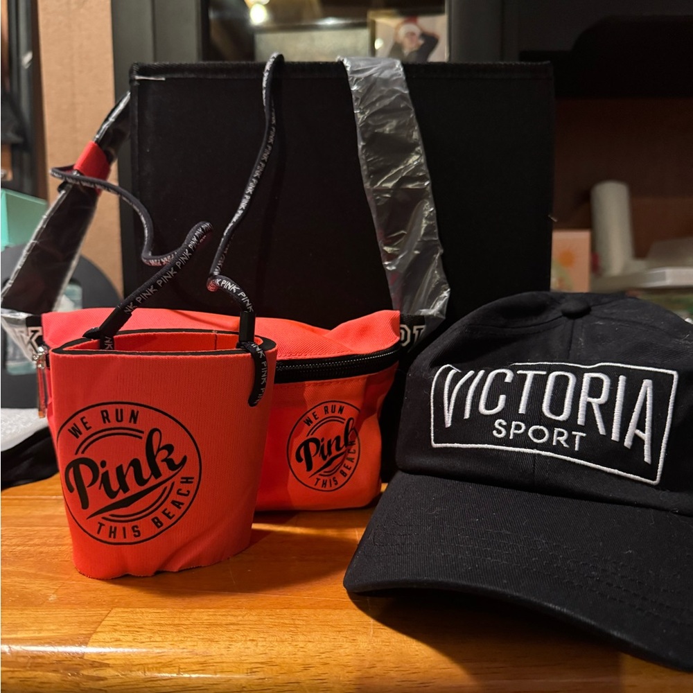 Pink belt bag with koozie and Victoria Secret Hat